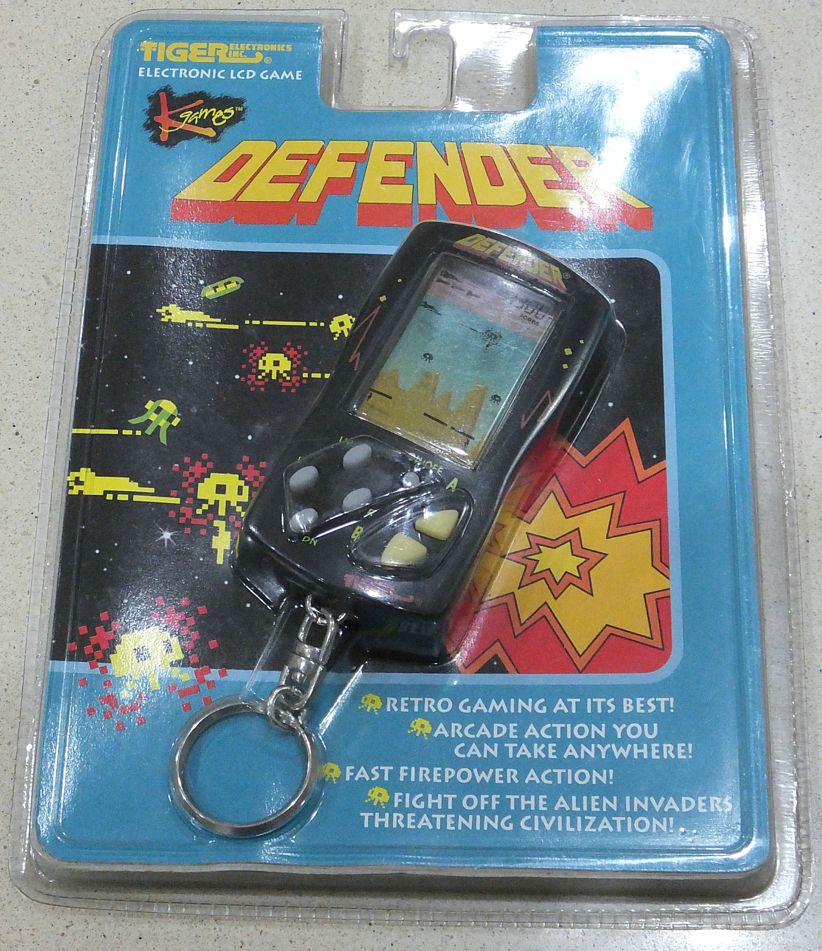 NEW Free Shipping Tiger Electronics Tempest Extreme Chain Games LCD Key Chain 